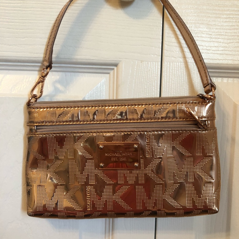 Michael kors rose gold wristlet